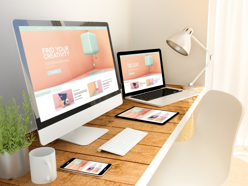 Responsive layout across multiple devices showcasing modern startup website design.