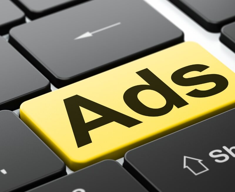 Ads key highlighted on a computer keyboard representing digital advertising and online marketing