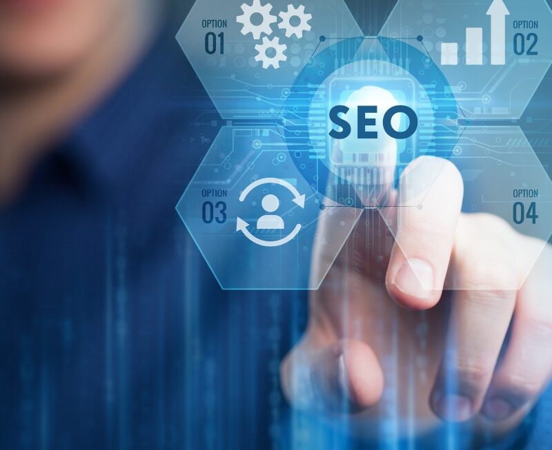 Person interacting with a digital interface highlighting SEO options and technology icons.