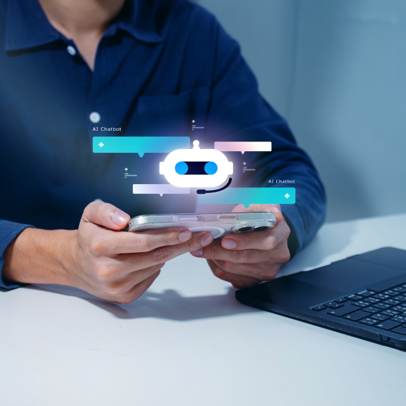 A user holding a smartphone that displays a glowing robot chatbot graphic, representing an interactive ai search assistant interface.