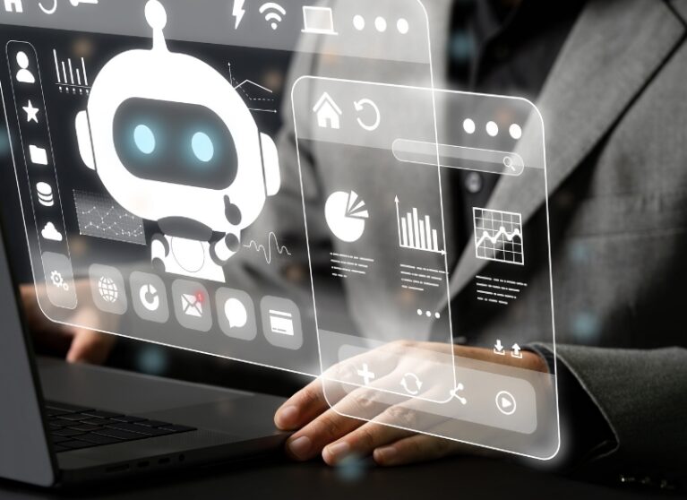 A person in a suit sits at a desk, with hands resting, beside a holographic interface displaying an AI Automation chatbot, data charts, and various icons.